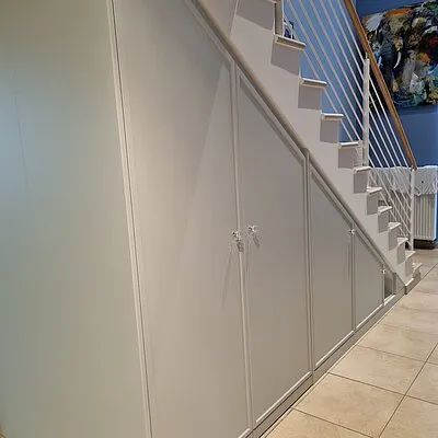 Fitted storage beneath a staircase