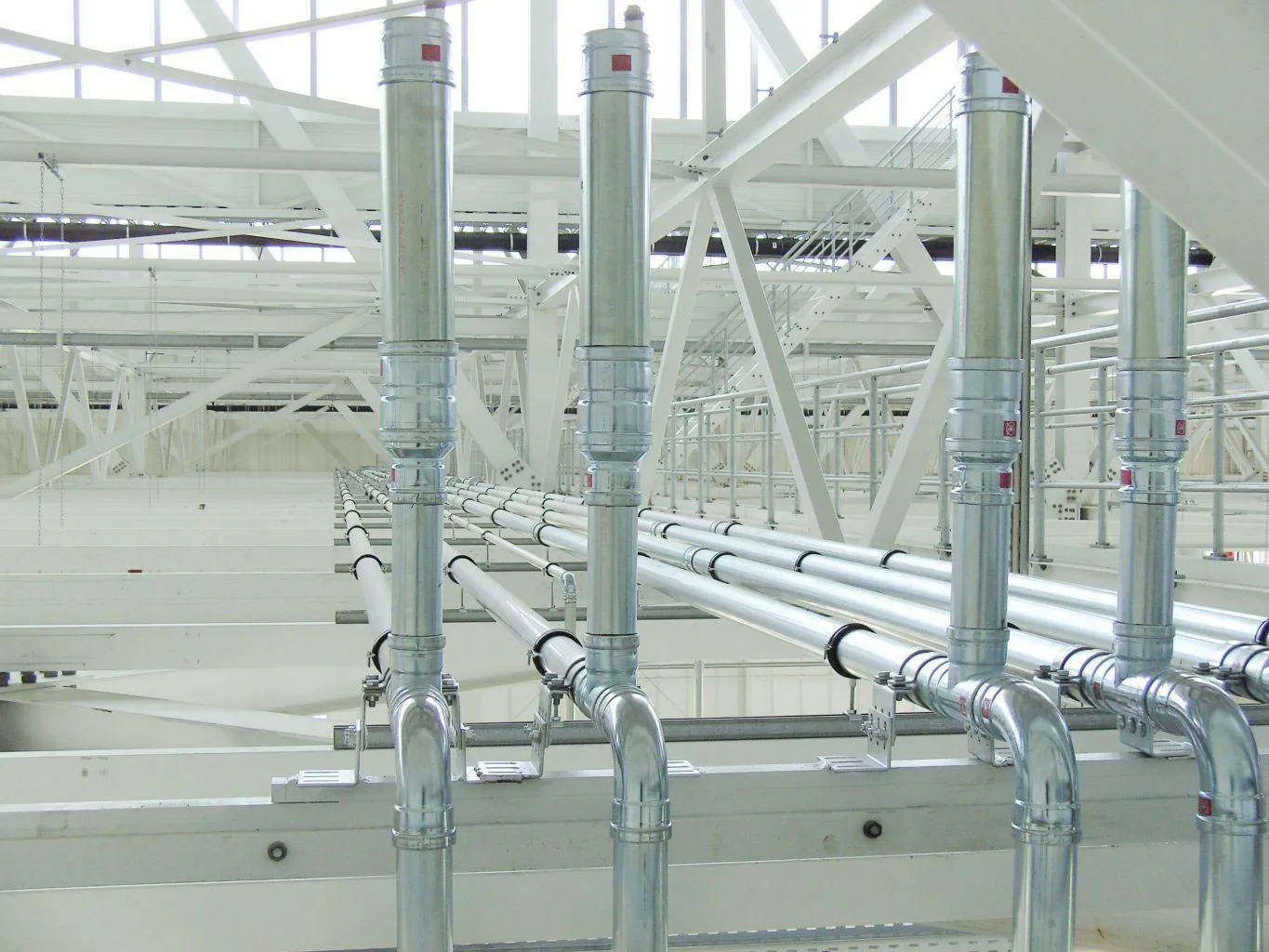 Pipework and ventilation ducts in a plant room