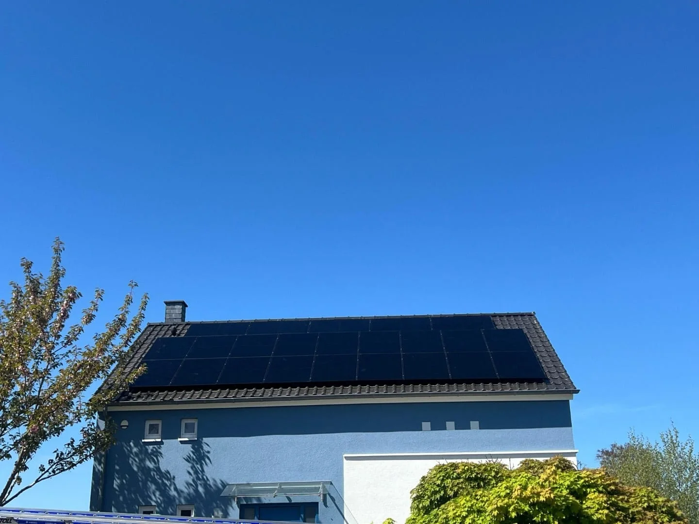 Panels across the whole south-facing roof of a house