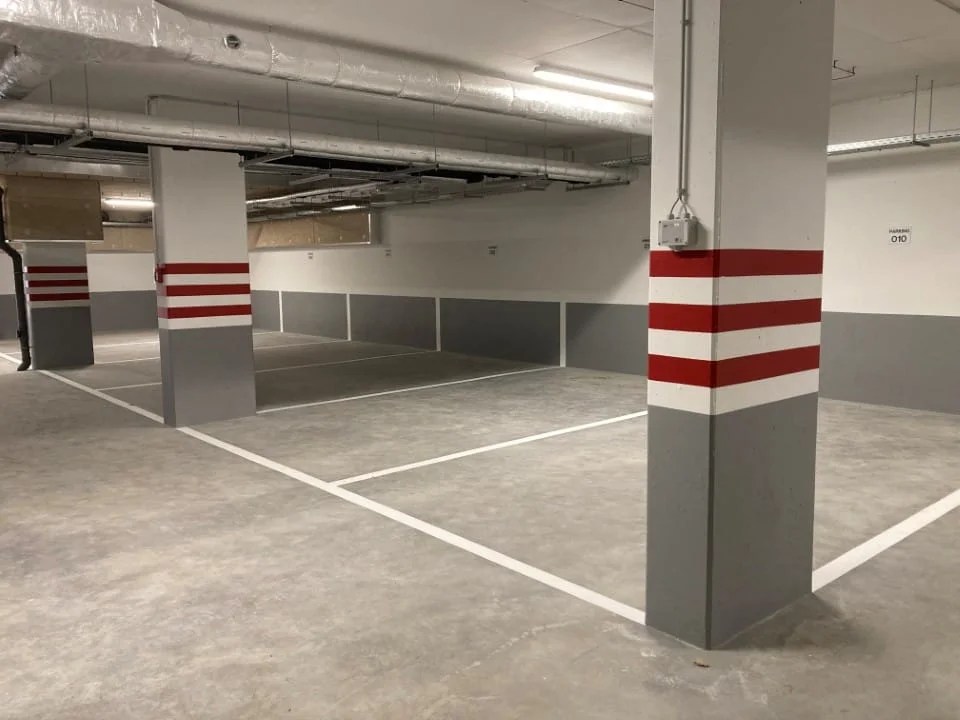 Car park with painted columns and traced floor lines