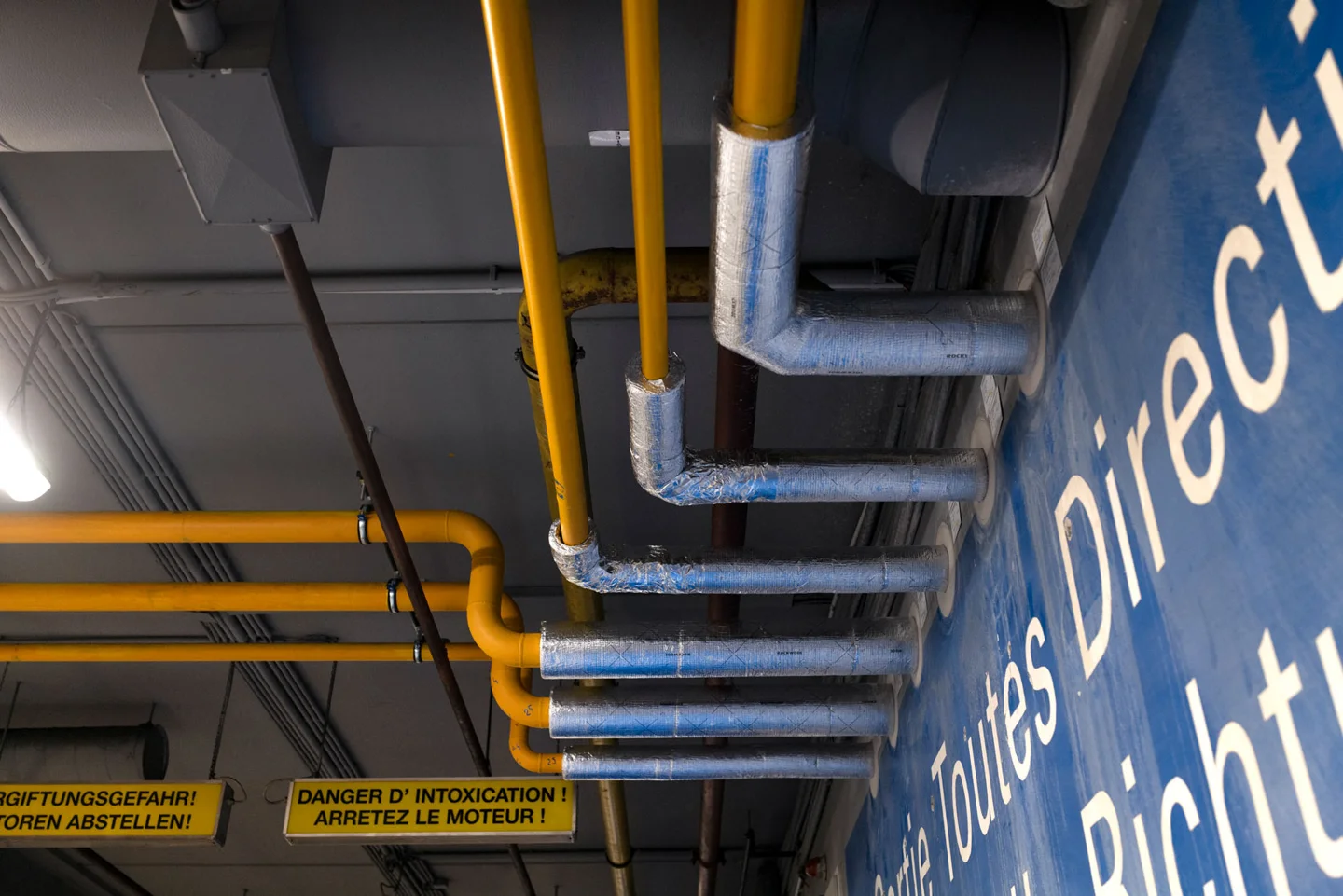 Gas pipes running under a ceiling
