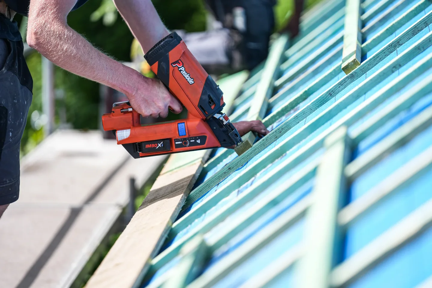 HEPP roofer cutting a metal sheet on site