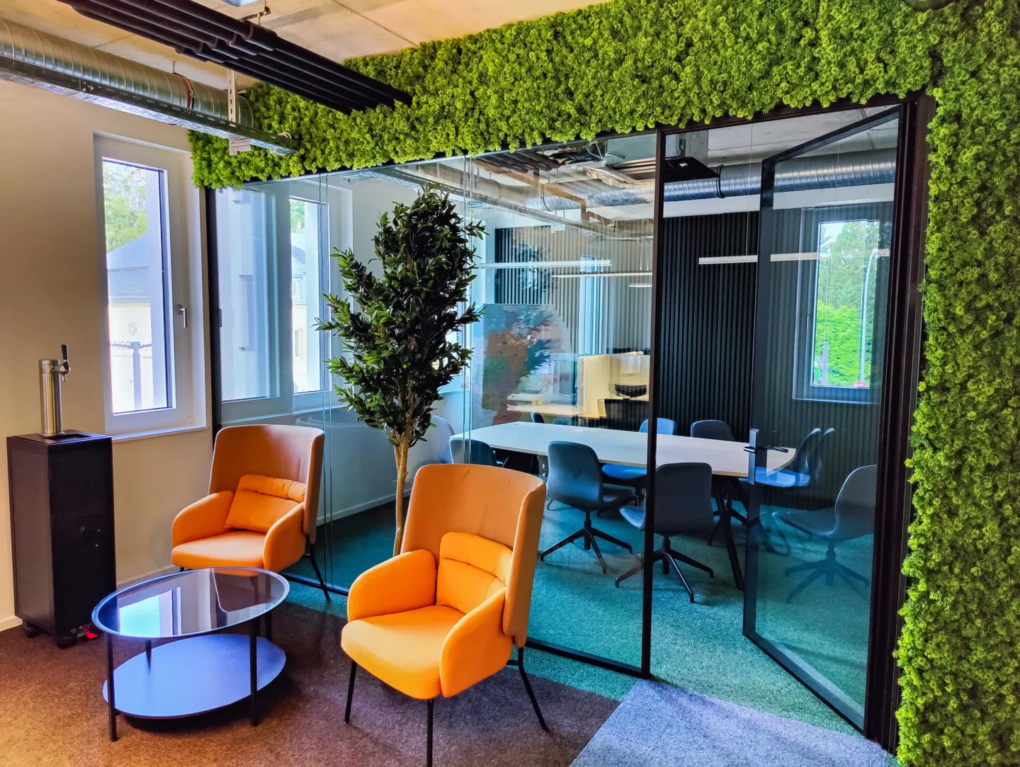 Office fit-out with a moss wall and café corner