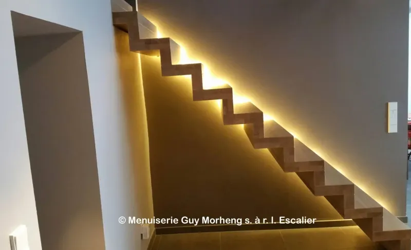 Floating wooden staircase with integrated lighting.